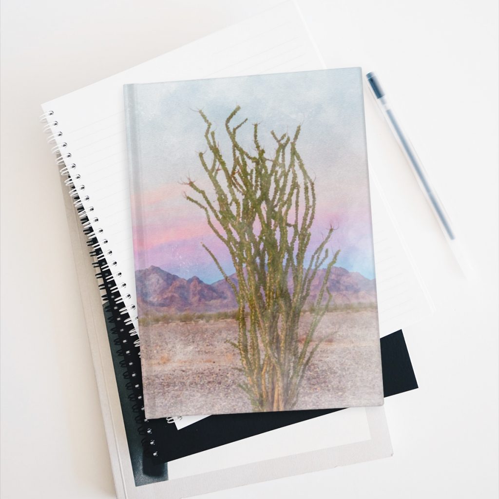 Ocotillo Sunset hardcover journal on stack of books