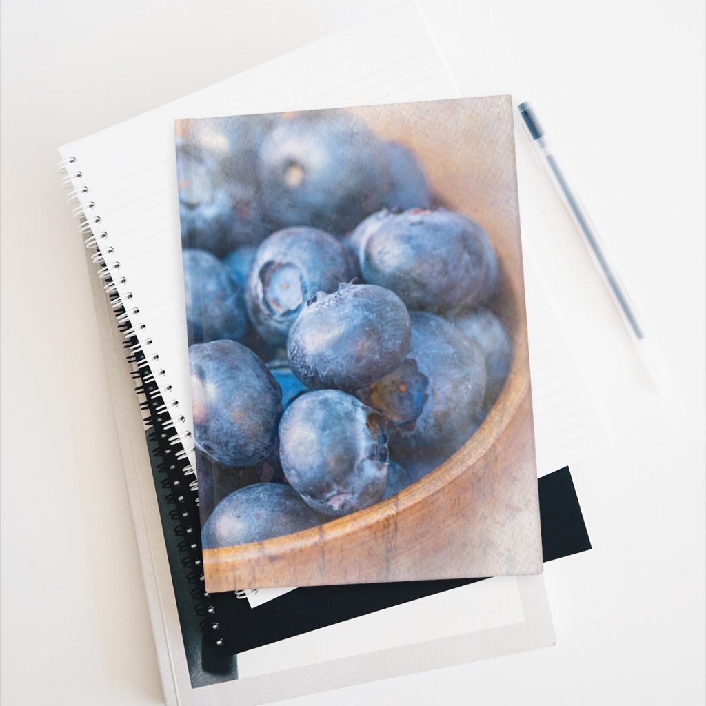 Bowl of Blueberries hardcover journal on stack of books