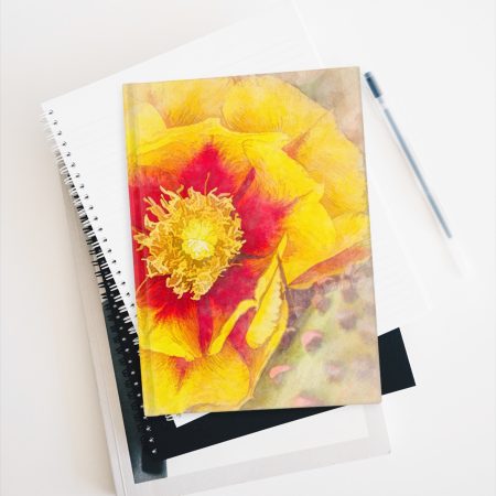 Cactus Bloom hardcover journal on stack of books