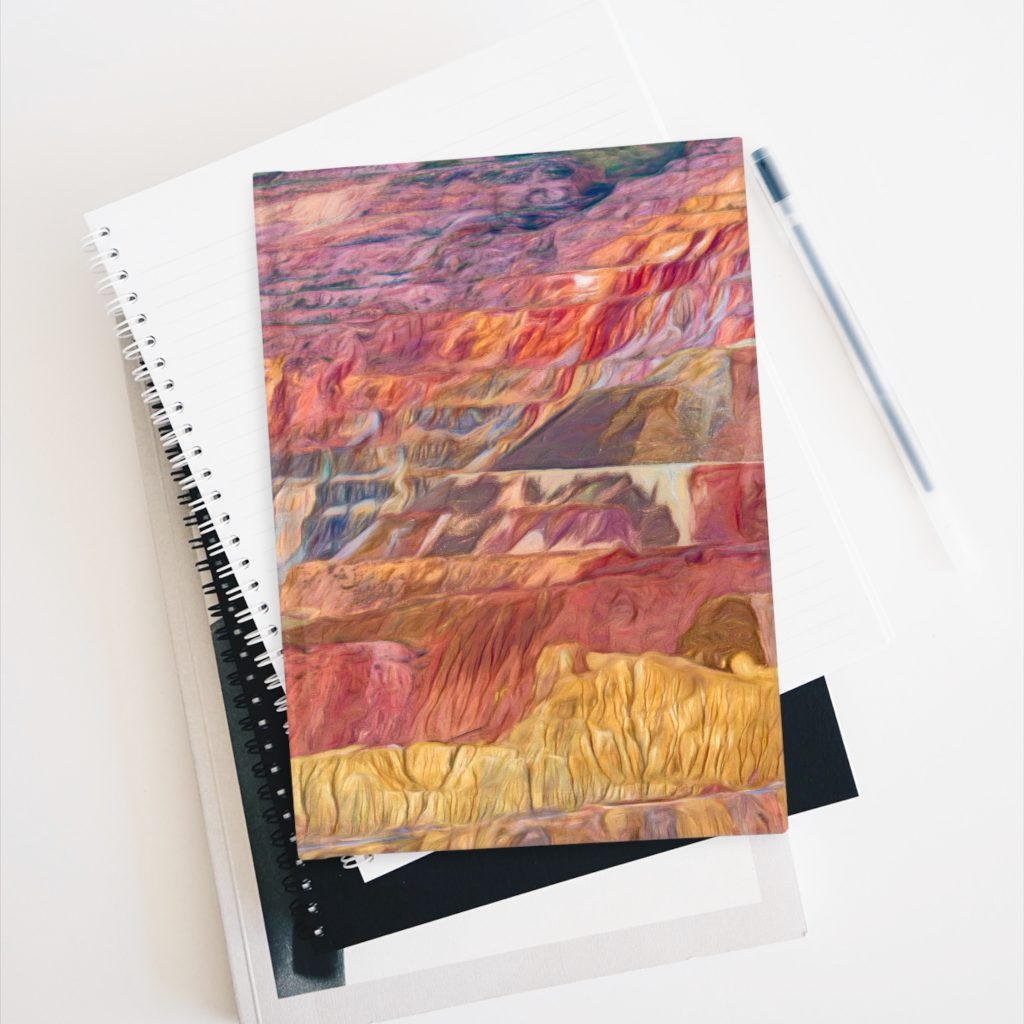 flight of strata hardcover journal on stack of books