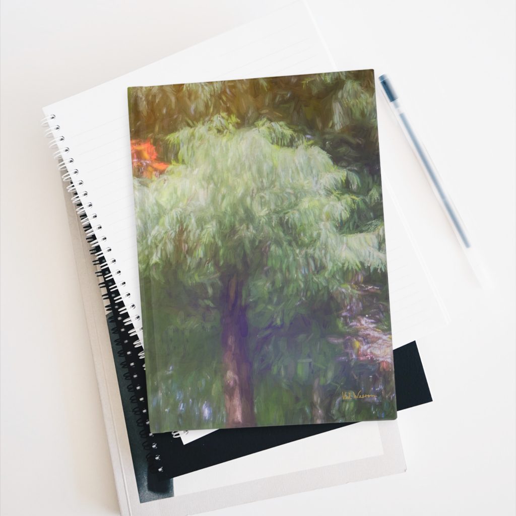 Autumn Reflections hardcover journal on stack of books